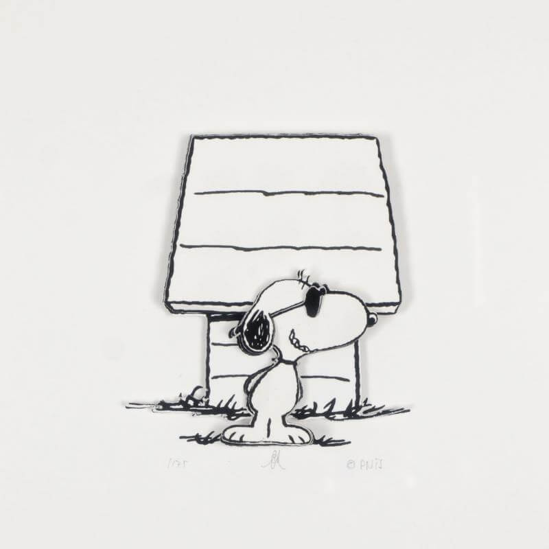 Snoopy dog wearing sunglasses as "Joe Cool" infront of his famous dog house