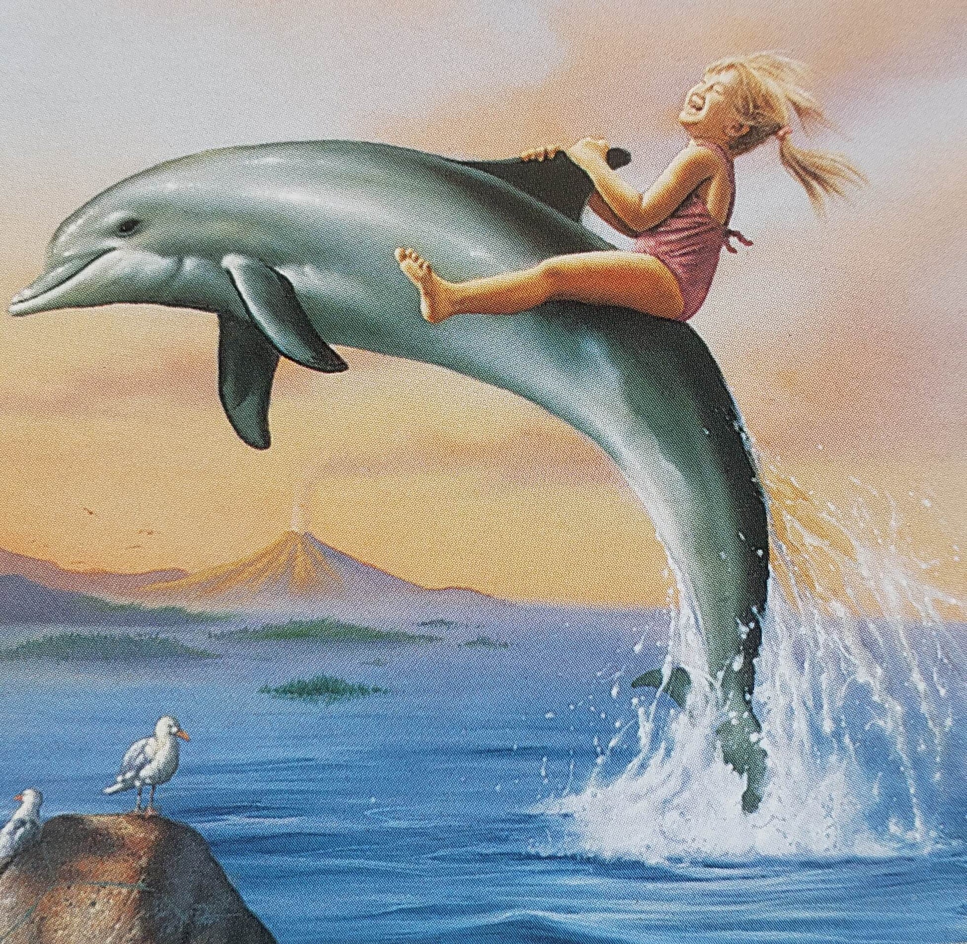 girl riding dolphin